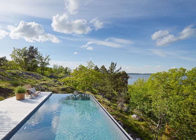 Andreas Martin-Löf designs a house on a hill near Stockholm overlooking the treetops