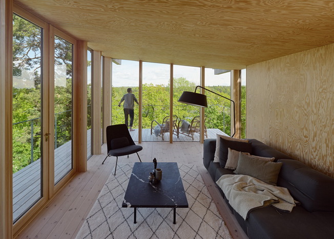 Andreas Martin-Löf designs a house on a hill near Stockholm overlooking the treetops